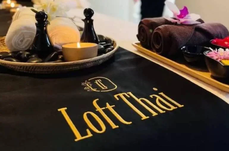 Loft Thai branded treatment materials illustrating the venue named in travel listings