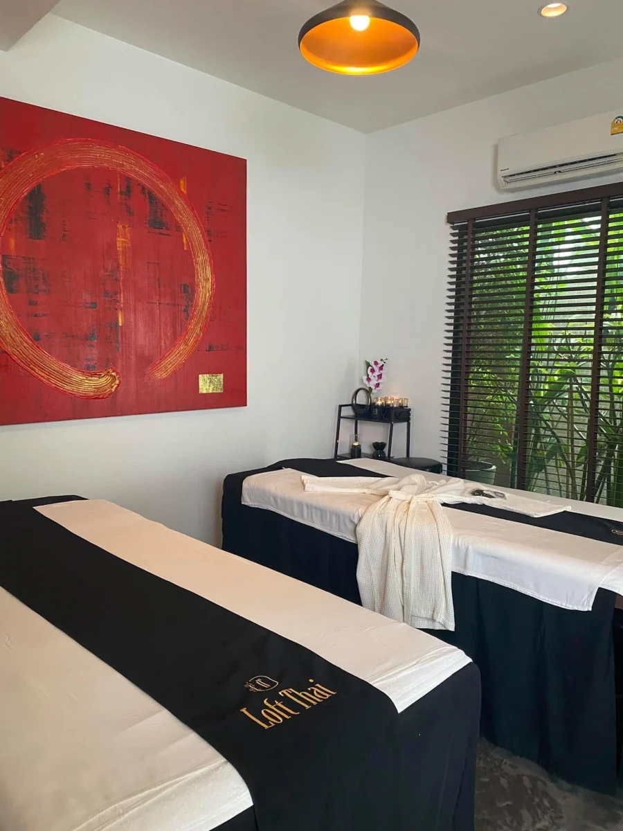 Private treatment room prepared for body-care changing, draping, product application and removal