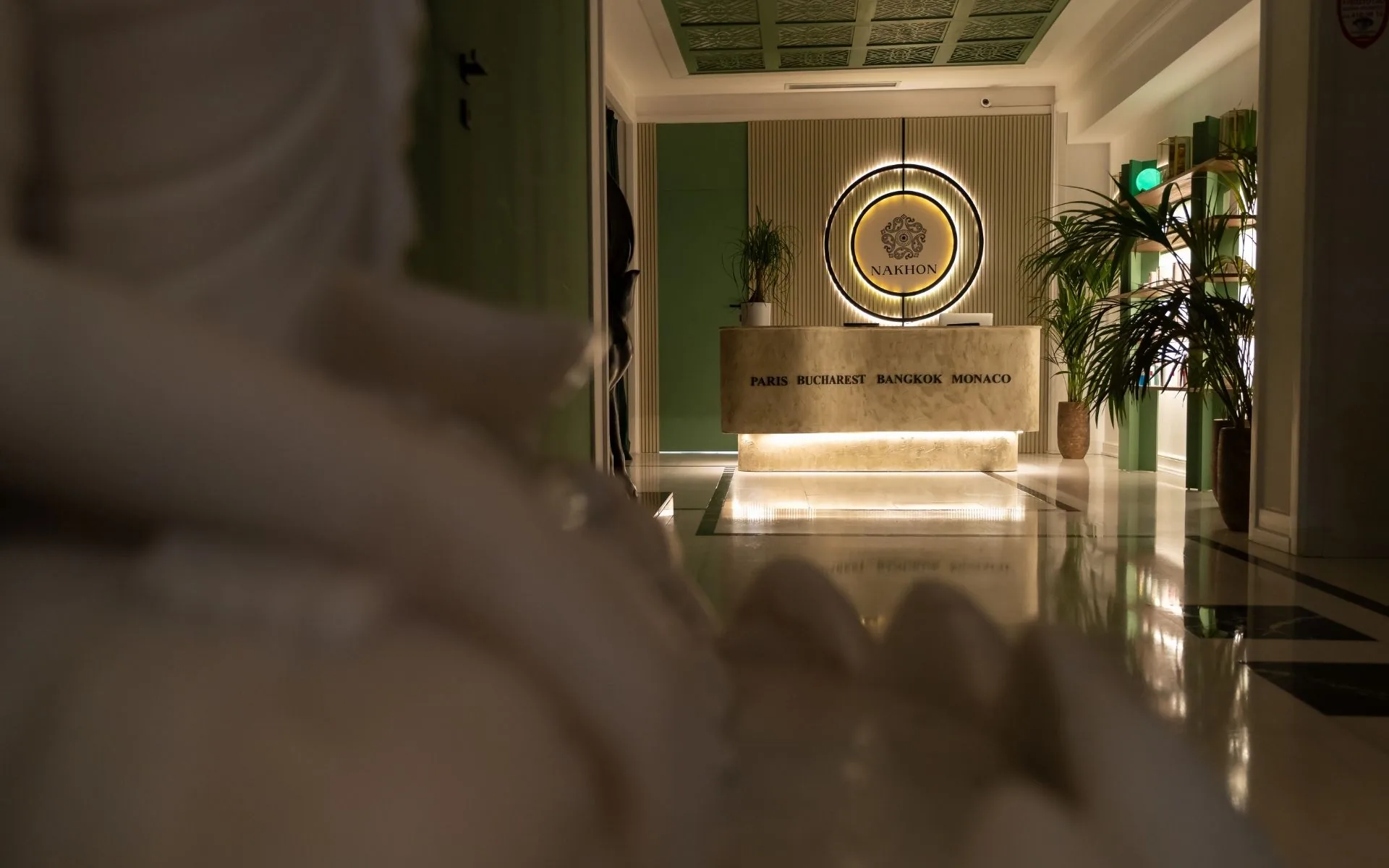 Nakhon Spa Bucharest reception with its illuminated brand emblem