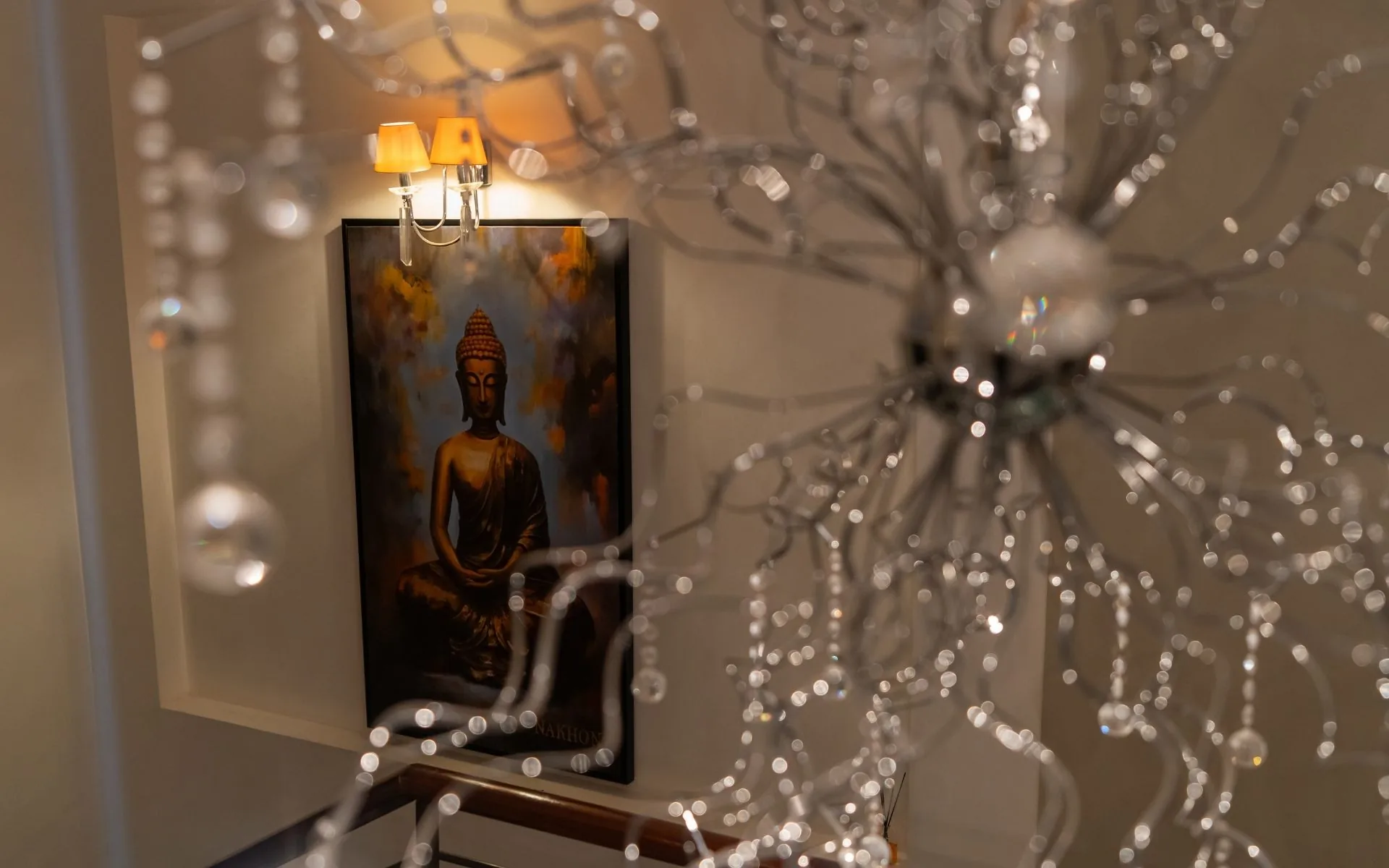 Buddha artwork and crystal lighting detail at Nakhon Spa Bucharest