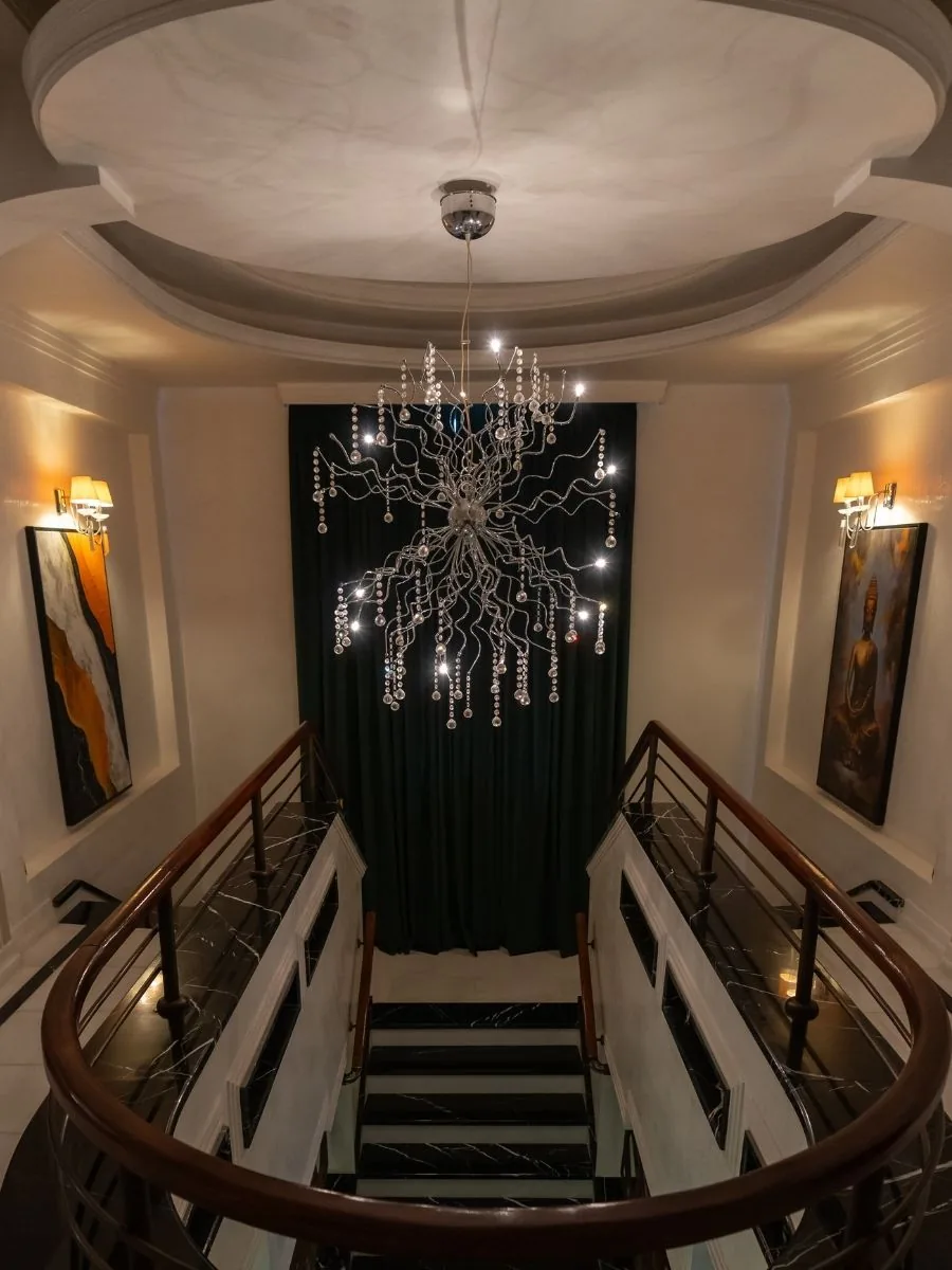 Central staircase and chandelier inside Nakhon Spa Bucharest